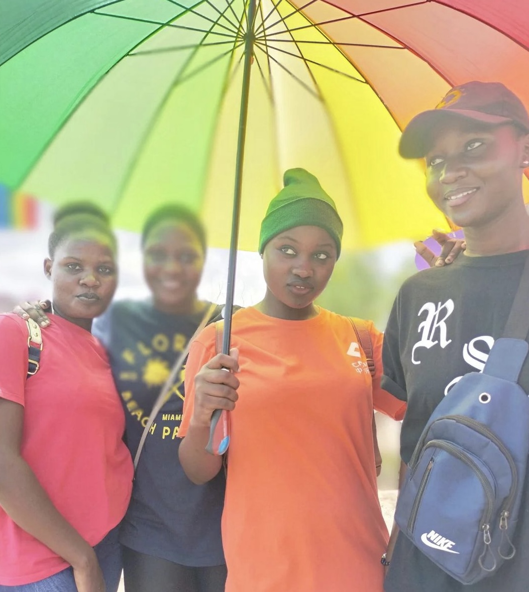 Erisa with a rainbow umbrella